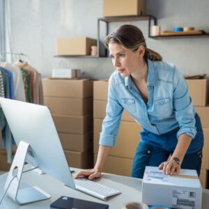 Woman managing online storage inventory